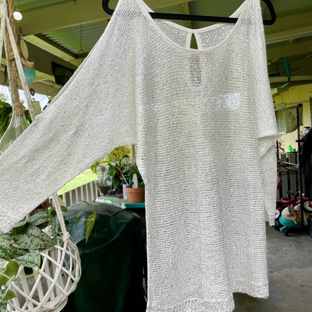 Cold shoulder Blouse, 3/4 sleeve mesh with white sequins throughout the blouse.